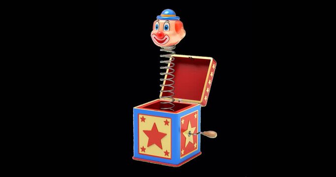 Jack in the box jumping out from a colorful box - 3D animation isolated on transparent background
