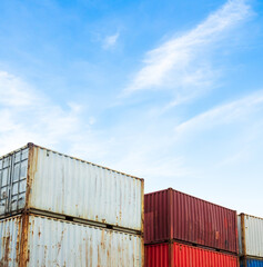 Fototapeta premium Cargo ship container goods export import international transport on blue sky background, warehouse industry business logistics transportation harbor port industrial shipping terminal cargo ship.