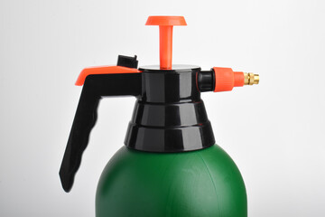 Naklejka premium Hand pressure garden sprayer isolated on white background.