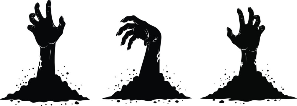 Creepy zombie hands rising from the ground
