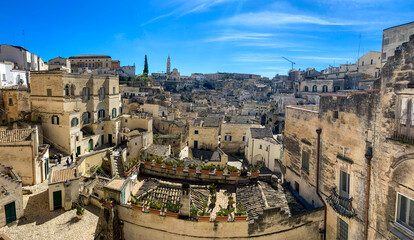 Naklejka premium Panoramic view to the Sassi di Matera, an ancient cave-dwelling complex in the city of Matera, Basilicata, Southern Italy.