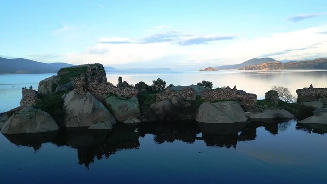 Panoramic View of Ancient Monastery Ruins on Bafa Lake Island at Dawn. High quality 4k footage