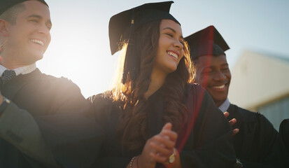 Graduation, friends and group of people with college goal, achievement or award celebration. Flare, scholarship and students with education success for development, growth or study at university. © peopleimages.com