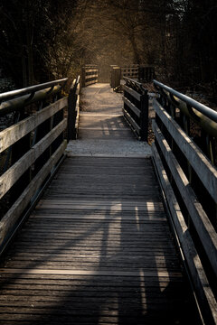 Wooden Pedestrian Bridge In Emmering Over Amper River: Perspective Walkway Between Olching And Fuerstenfeldbruck Near Munich
