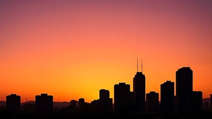 Fototapeta premium simplified. City silhouette at dusk with geometric buildings against a gradient sunset sky. inspiring travel planning.