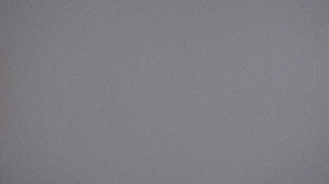 A close-up view of a white wall, perfect for a clean and minimalist background or a blank canvas for creative projects.