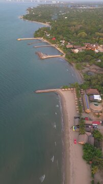 Drone flying over Covenas beach in Colombia's Caribbean Sea