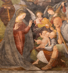Naklejka premium VERCELLI, ITALY - JANUARY 16, 2026: The detail of renaissance fresco of Nativity - Adoration of shepherds in the church Chiesa di San Cristoforo