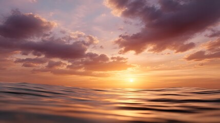 Obraz premium Vibrant sunset painting the sky with hues of orange pink and purple over the calm reflective ocean surface