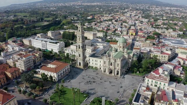 Aerial Drone View of Main City Square in Pompeii with Historic Architecture Buildings and Catholic Church. Piazza Bartolo Longo. Campania Region in Italy. UNESCO World Heritage Site.