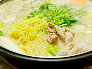 Steaming Hot Pot with Creamy White Soup, Vegetables and Noodles, Japanese Winter Food