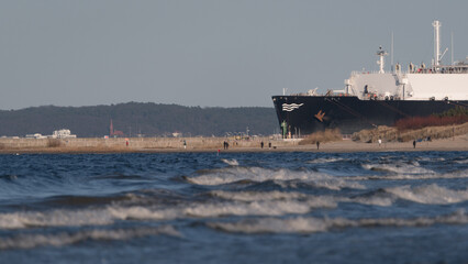 MARITIME TRANSPORT - Sea coast and LNG tanker at the gas terminal 