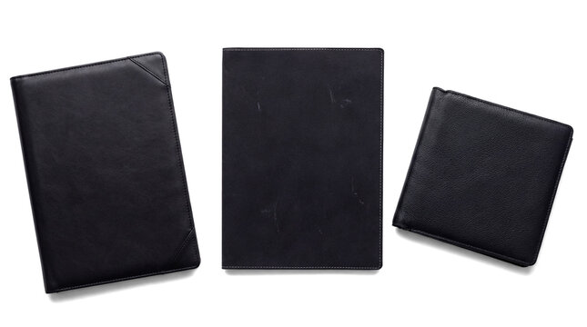 three black leather binders and a small black leather wallet on a transparent background, top view.