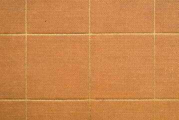 Fototapeta premium Vintage Orange Canvas Texture Background with Gold Grid Pattern