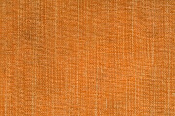 Warm Orange Fabric Texture Background with Vertical Fiber Grain