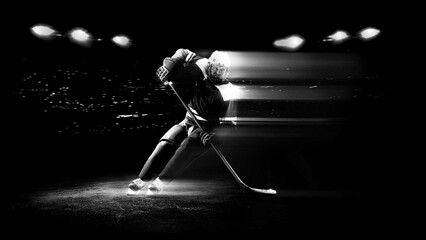 Ice hockey player skating fast with speed light trail effect on arena ice used for winter sports advertising, hockey promotion and competitive campaign visuals. © master1305