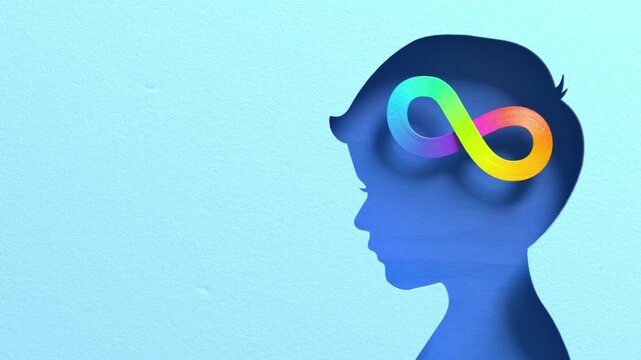 Looping video of blue child head silhouette with colorful rainbow infinity symbol representing autism, cognitive diversity and inclusive mental health awareness in paper cut 3D animation