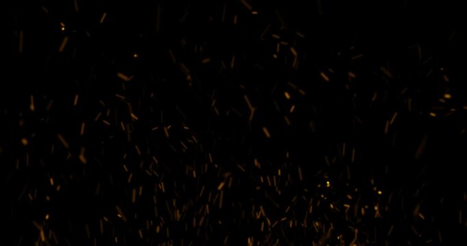 fire sparks from campfire with ash rise over black background, danger explosion