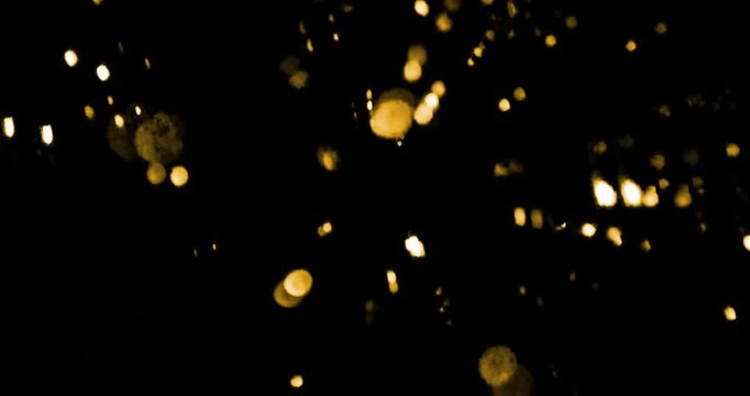 multicolor golden glittering christmas background floating with bokeh, gold holiday happy new year
