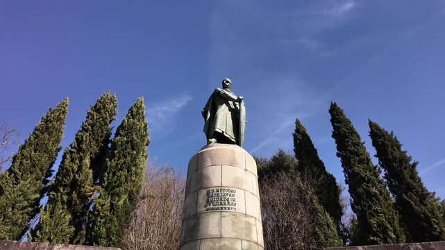 Guimaraes city monuments Dom Afonso Henriques statue on a sunny day. Gimbal shot closing in.