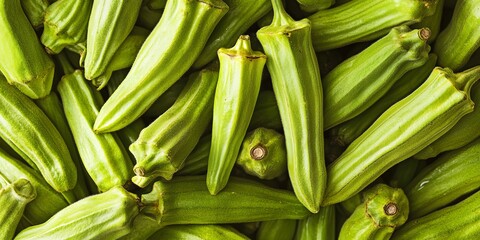 Obraz premium Close-Up of Vibrant Green Okra Harvest Displayed at a Farmer s Market, Fresh Organic Vegetables