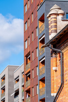 Modern brick building facade architecture detail in Stockholm Sweden Djurgardsstaden showing layered materials and windows in clean daylight