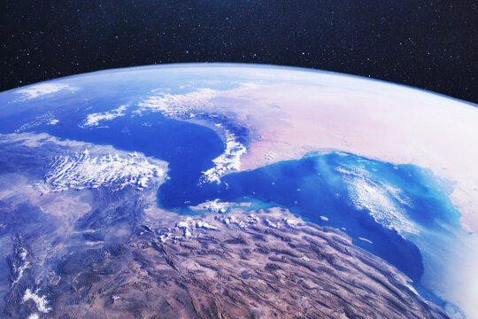 satellite view of the Strait of Hormuz and Iran from space. Conceptual for geopolitical conflict, oil supply blockade, military tension in the Middle East. Elements of this image furnished by NASA