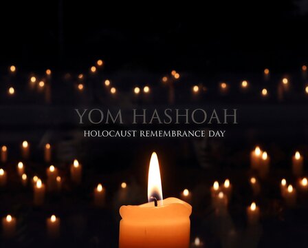 Yom Hashoah Holocaust remembrance day with candles in the dark