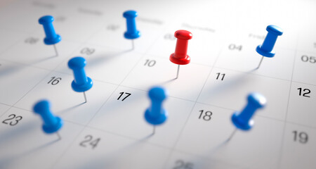 Red and blue thumbtack pins in calendar concept for busy, appointment and meeting reminder - 3D illustration