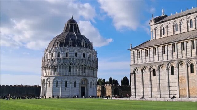 Pisa. Italy,Piazza dei Miracoli, listed among the UNESCO World Heritage Sites since 1987, is where you can admire the four monuments that form the centre of the city's religious life


