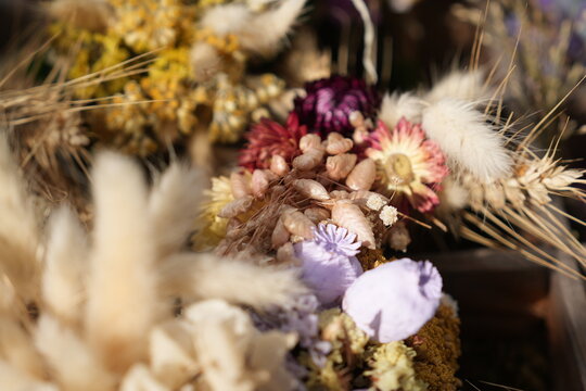 Rustic dried flower bouquets with wheat lagurus and grasses craft market