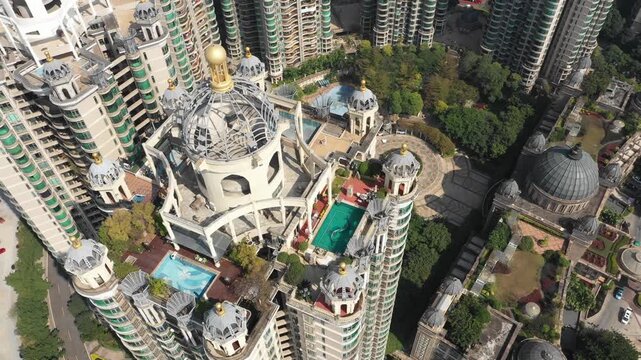 Rotating drone shot of high-end real estate in Guangzhou, prestigious housing in modern Chinese city