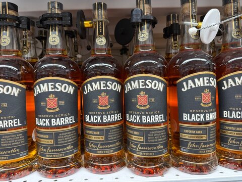 Mallorca, spain, february 20, 2026, jameson black barrel reserve series irish whiskey bottles on a retail shelf with security caps