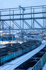 Naklejka premium railroad in blue winter dusk , Murmansk