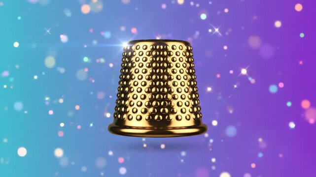 Luxurious gold thimble floating in shimmering light and sparkling bokeh with a gradient background