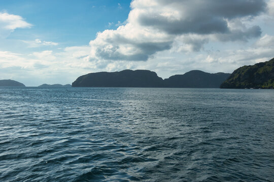 
PALAWAN, PHILIPPINES - DECEMBER 21, 2023: Tropical islands  in El Nido on Palawan Island in the Philippines. 6 million tourists visited Philippines in 2016. On a hot sunny afternoon. Beautiful scener