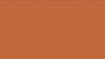 Obraz premium Vibrant orange fabric texture background with small dots pattern