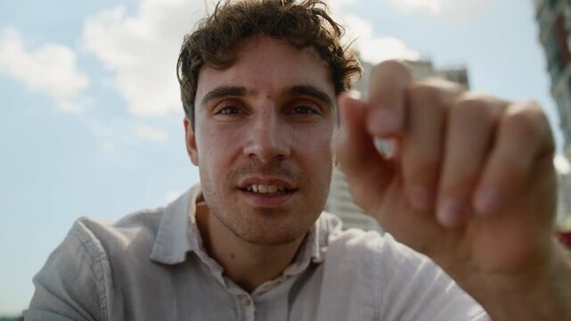 Portrait successful Caucasian business man tapping with index finger invisible template for hologram businessman male guy professional scrolling zoom data in holographic touchscreen slide in city