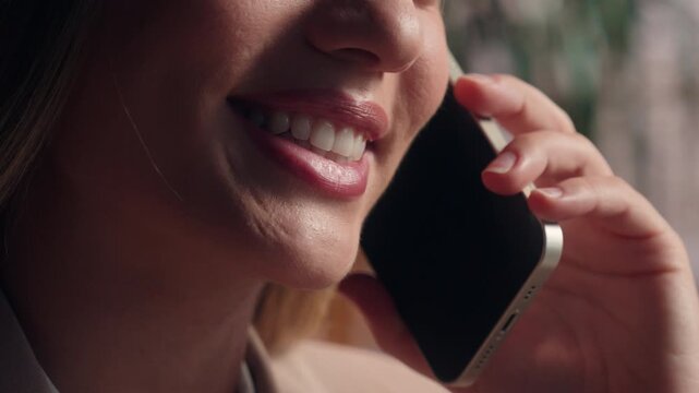 Cropped view female mouth lips talking mobile phone call smiling happy laughing close up unrecognizable business woman talk smartphone smile cheerful unknown girl half face speaking telephone carefree