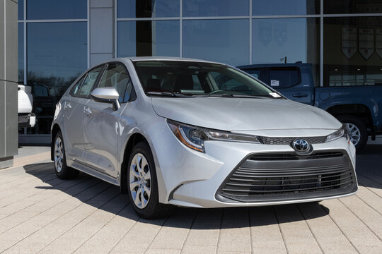 Toyota Corolla LE compact sedan display at a dealership. Toyota offers the Corolla with a 2.0L 4-Cylinder VVT engine. MY:2026