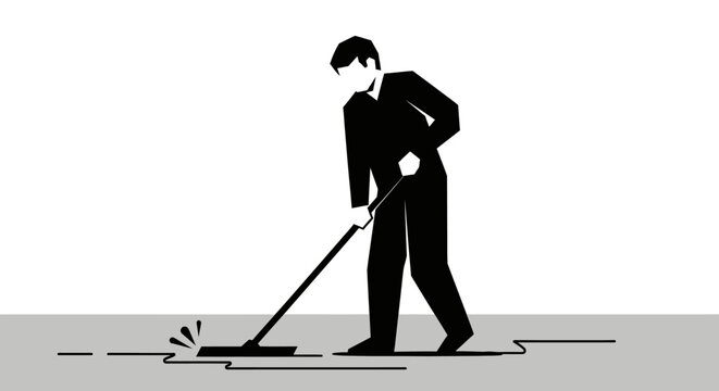 Man in suit sweeping the floor.