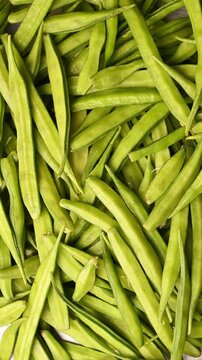 Top View of Fresh Gawar Ki Phalli (Cluster Beans) &ndash; Green Vegetable Vertical Footage