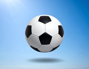 Fototapeta premium Soccer Ball Floating in Mid-Air with Shadow Against a Clear Blue Sky