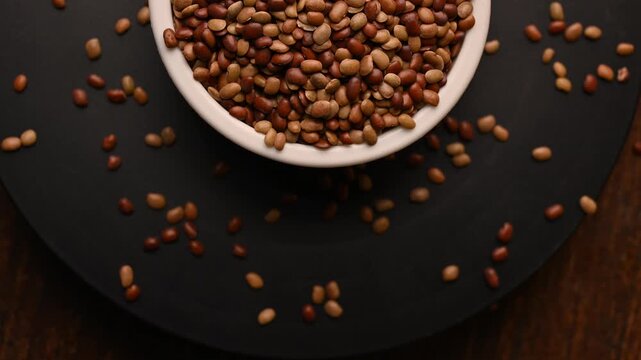 Rotating Top View of Horse Gram (Kulthi Dal) in Bowl &ndash; Healthy Pulse Footage