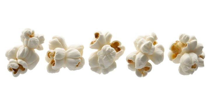A delicious serving of freshly popped popcorn on a white background