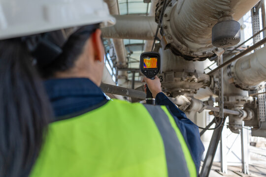 Engineer uses a thermal camera for predictive maintenance on gas insulated equipment, detecting heat anomalies early to improve safety, reliability, and inspection accuracy.