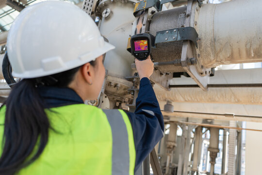 Engineer uses a thermal camera for predictive maintenance on high voltage equipment, detecting heat issues early to improve safety, reliability, inspection accuracy, and uptime.