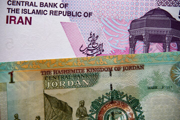 dinar jordański i rial irański, banknoty © Marcin Łazarczyk