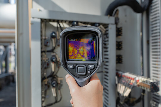 Thermal camera supports industrial monitoring inside an electrical control cabinet, revealing heat anomalies in wiring and components to improve safety, reliability, and diagnostics.