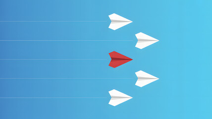 Fototapeta premium Paper airplanes flying in formation, one red plane leading, blue background